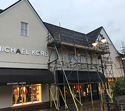 michael kors shop front surrounded by scaffolding